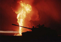 Tank with fire in background during the Gulf War