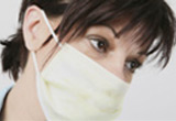Woman wearing a  surgical mask